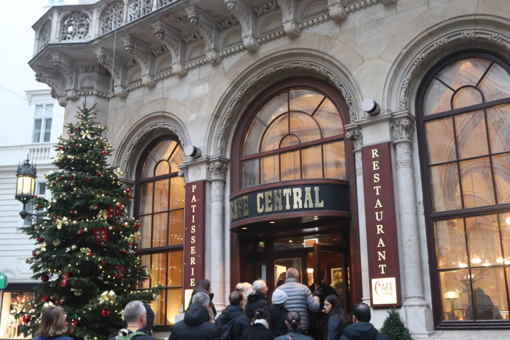 Eating Pastries in Café Central